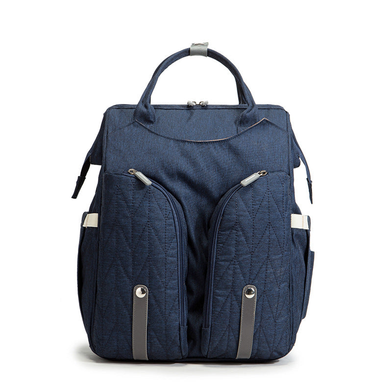 Diaper bag backpack shown for size and capacity reference
