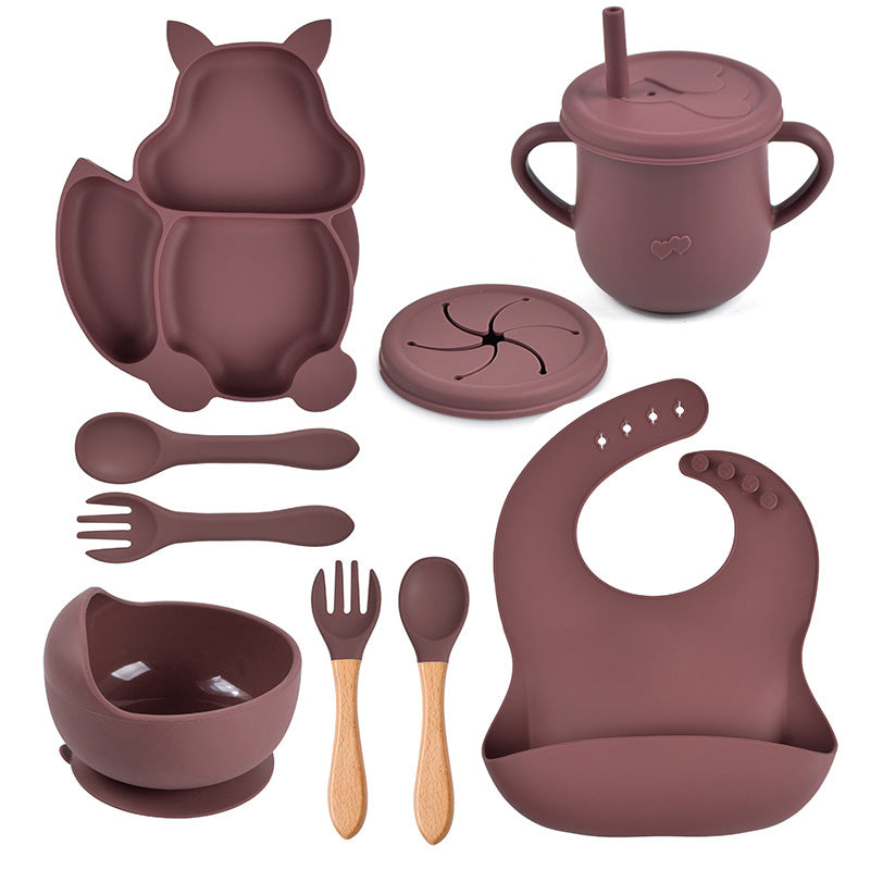Complete silicone baby feeding set laid out,