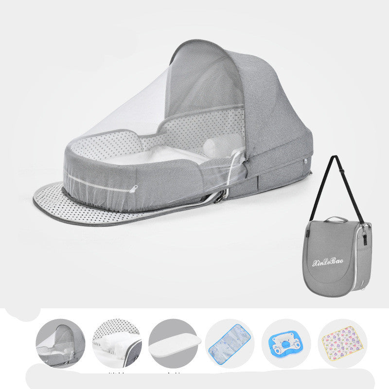 Portable baby bassinet with mosquito net
