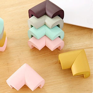 Baby corner guards stacked, multiple colors