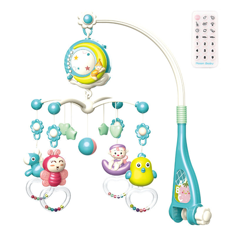 Crib mobile projector casting light display on nursery ceiling