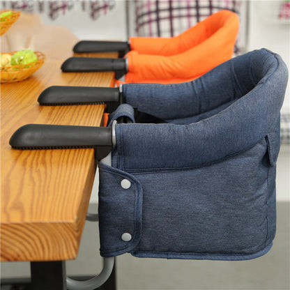 Blue baby High Chair with an orange cushion 