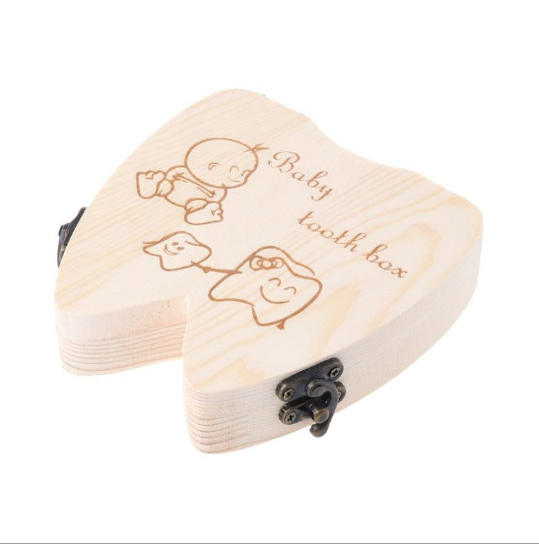 Wooden baby tooth box with illustrations of a baby