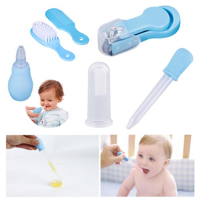 aby care products including a brush, comb, bottle, and dropper.