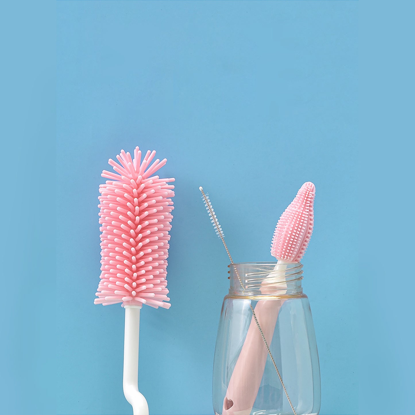 Silicone bottle brush set in pink with heart-cutout handle