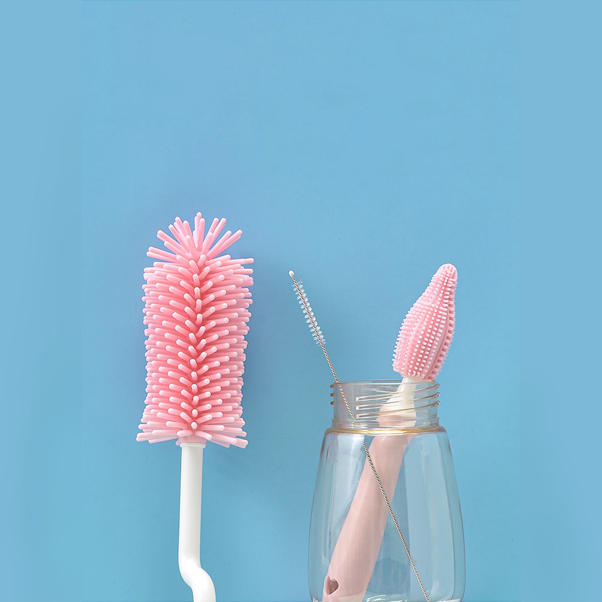 Silicone bottle brush set in pink with heart-cutout handle