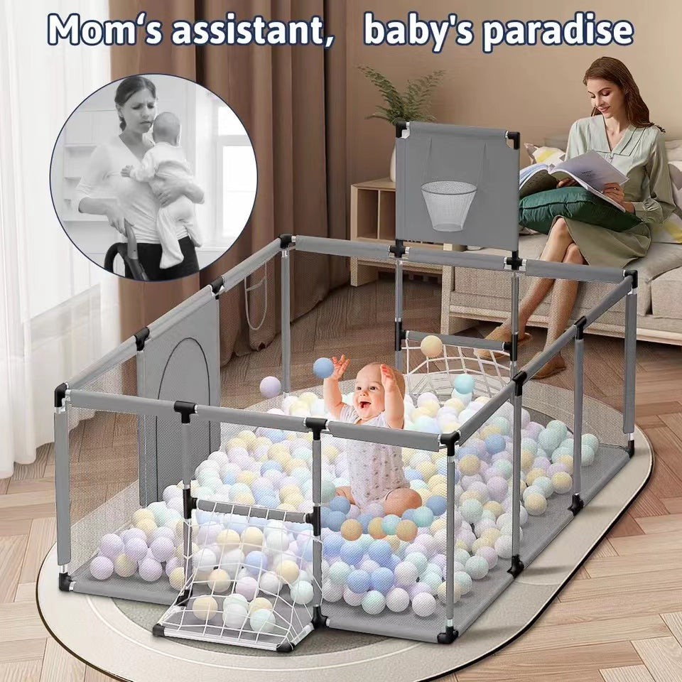 Mom watching baby in infant playpen