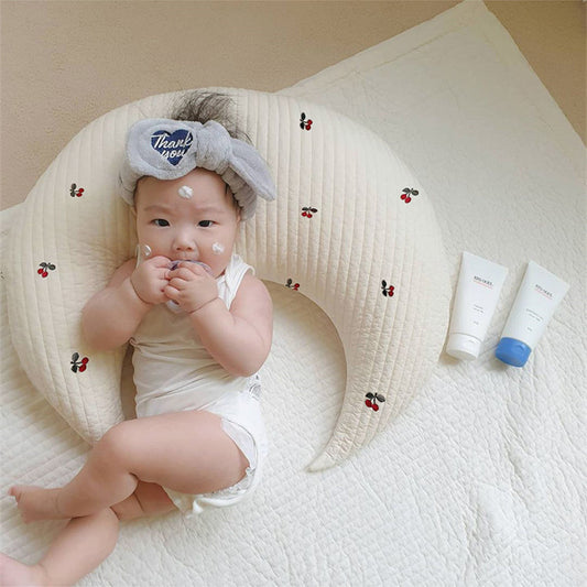 Crescent moon nursery pillow
