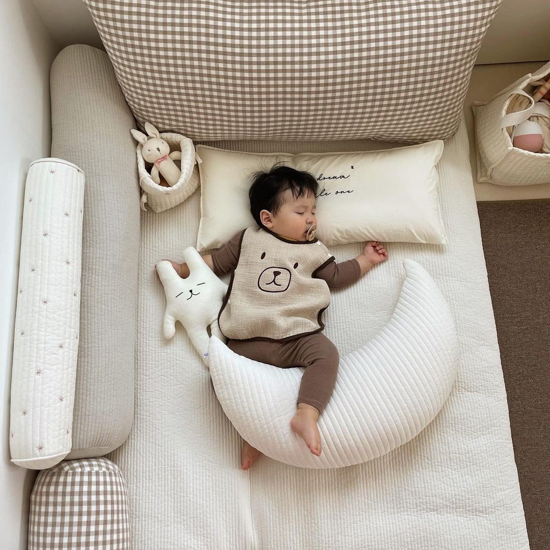 Cream crescent moon cushion
