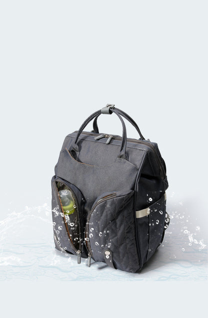  Foldable changing mat unfolded from diaper bag backpack