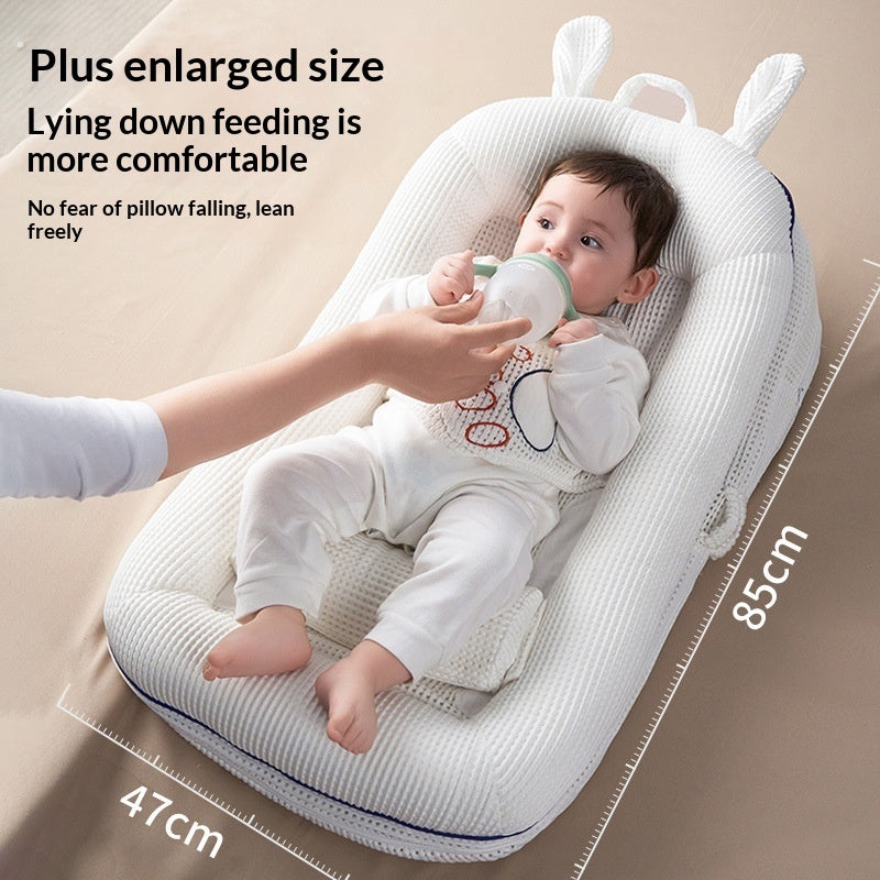 Newborn baby bed with breathable mesh design and support pillow