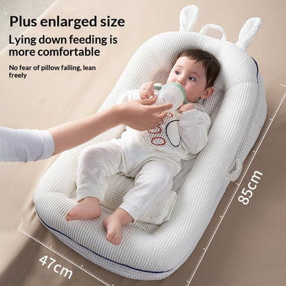 Newborn baby bed with breathable mesh design and support pillow