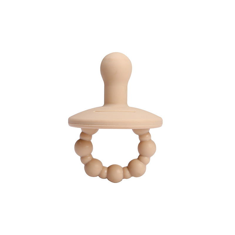 Silicone pacifiers in a set of neutral nursery colors