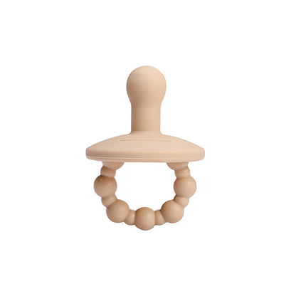 Silicone pacifiers in a set of neutral nursery colors