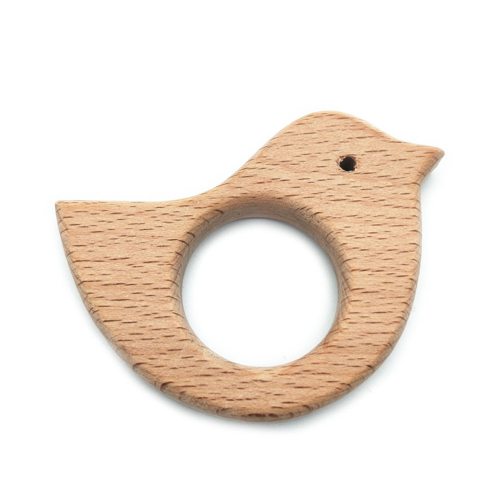 Handcrafted wooden baby teether in a fun carved shape