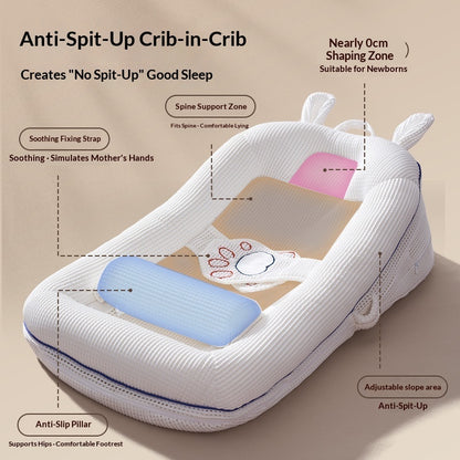 Soft newborn travel bed with raised sides and removable pillow