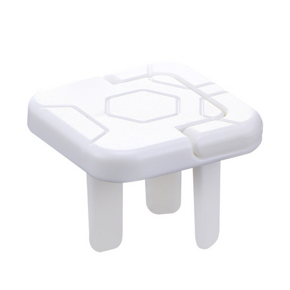 Removing childproof outlet cover from socket