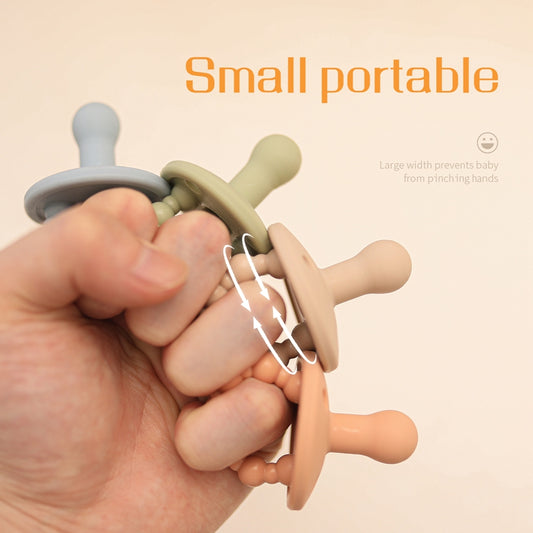 One-piece silicone pacifier with textured ring handle