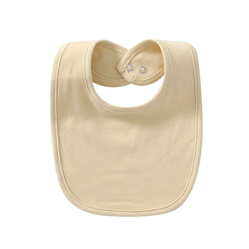 Beige waterproof cotton baby bib with snap closure