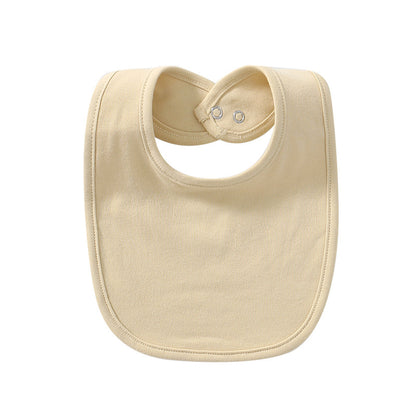 Beige waterproof cotton baby bib with snap closure