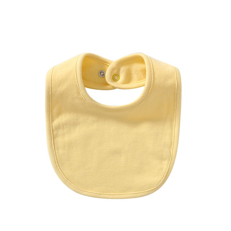 Yellow waterproof cotton baby bib with snap closure