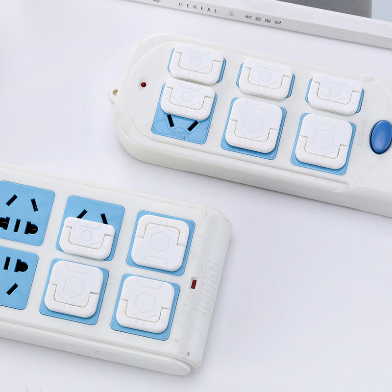 Childproof outlet covers on wall socket