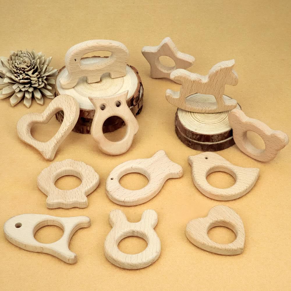 Natural wooden baby teether made from smooth beech wood molar stick