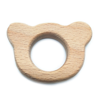 Fish shaped wooden baby teether for small hands to hold